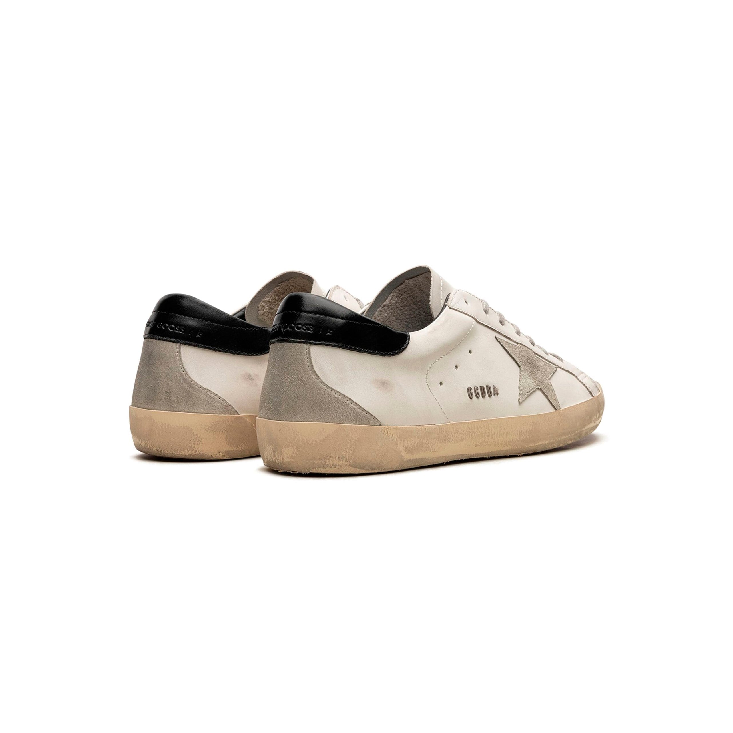 Golden Goose Super Star Bianche con Dettagli Neri e Stella Argento